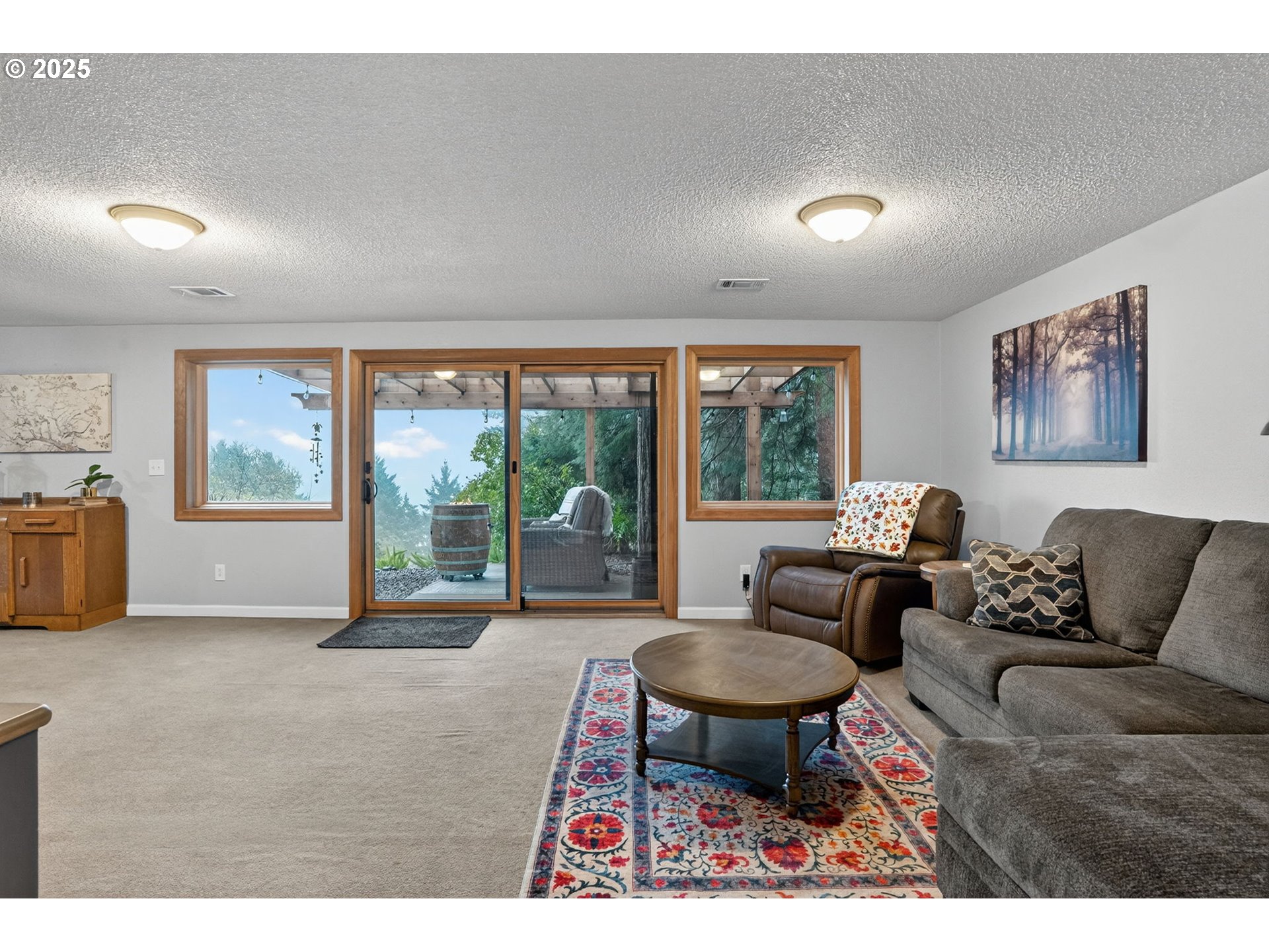 17542 Kirkwood Road Gladstone, OR 97027 - Photo 29 of 48 a living room with furniture and a large window