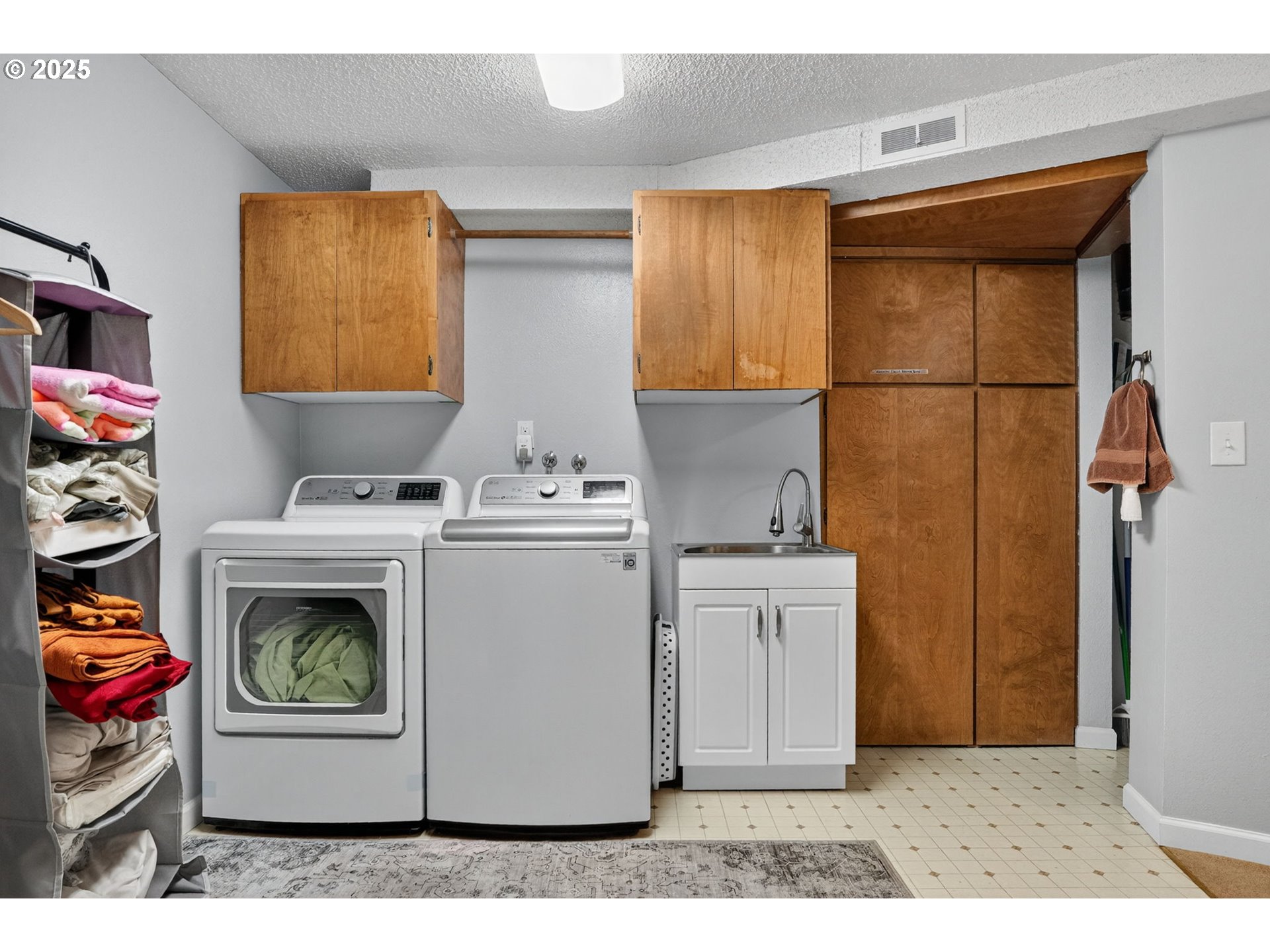 17542 Kirkwood Road Gladstone, OR 97027 - Photo 32 of 48 a utility room with closet dryer and washer
