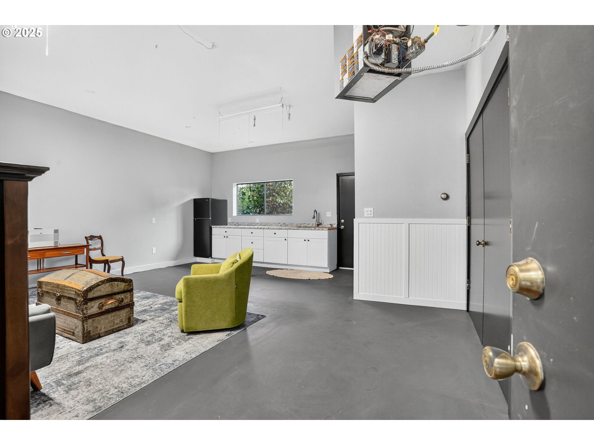 17542 Kirkwood Road Gladstone, OR 97027 - Photo 37 of 48 a living room with furniture and wooden floor