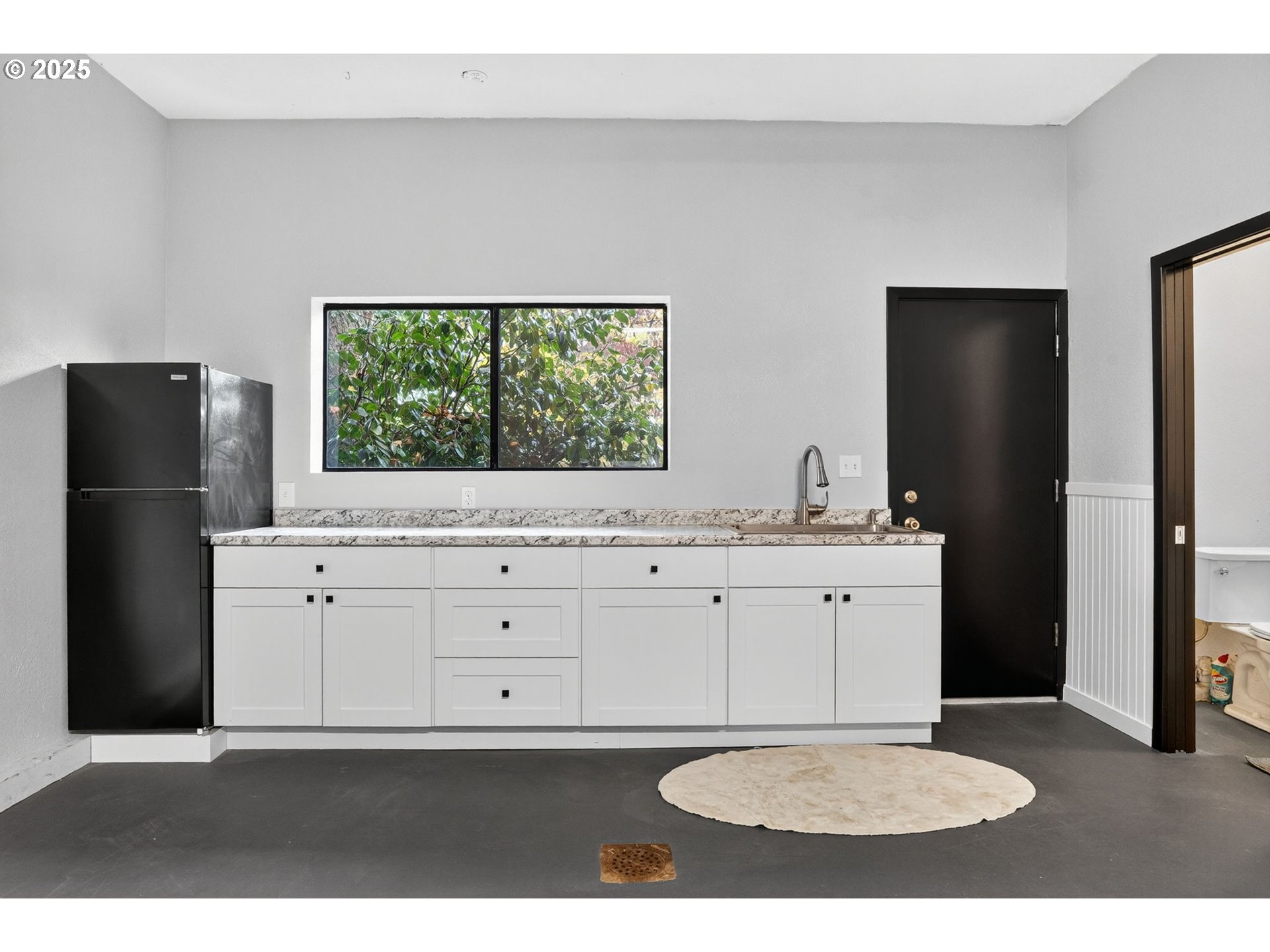 17542 Kirkwood Road Gladstone, OR 97027 - Photo 39 of 48 a bathroom with a sink toilet and a mirror
