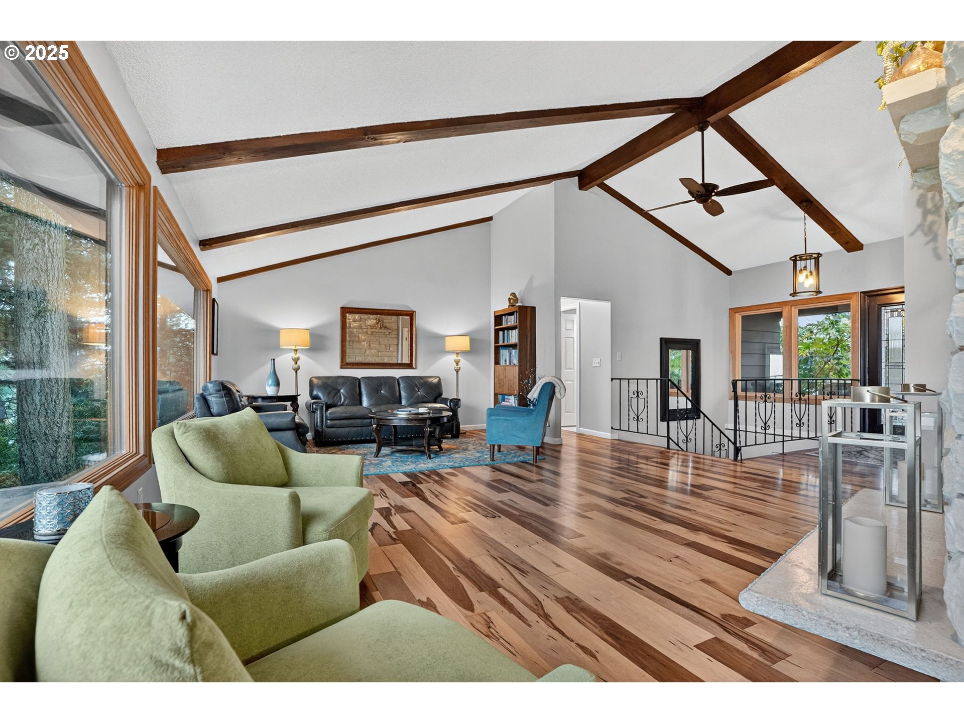 17542 Kirkwood Road Gladstone, OR 97027 - Photo 9 of 48 a living room with furniture and a wooden floor