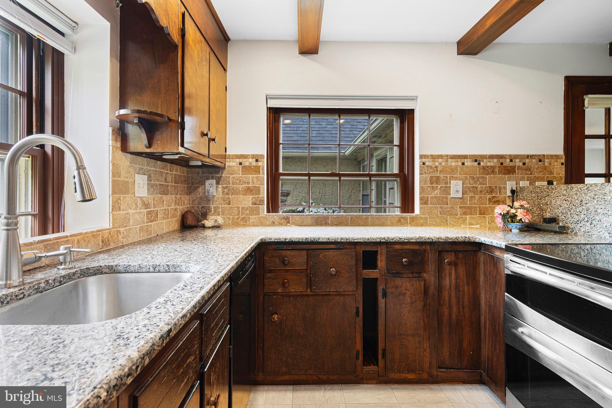 71 Forest Lane Swarthmore, PA 19081 - Photo 14 of 33 a kitchen with a sink and a window