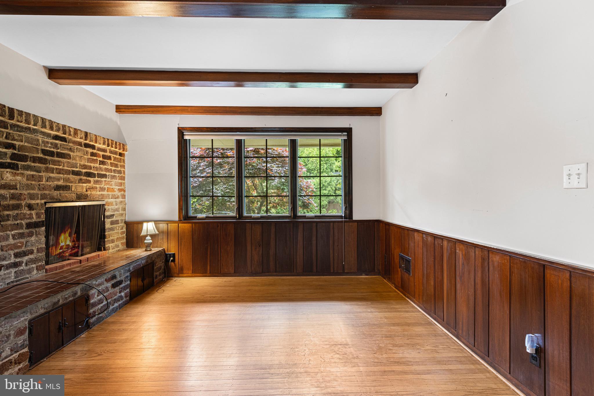 71 Forest Lane Swarthmore, PA 19081 - Photo 17 of 33 a view of wooden floor and a fireplace in a room