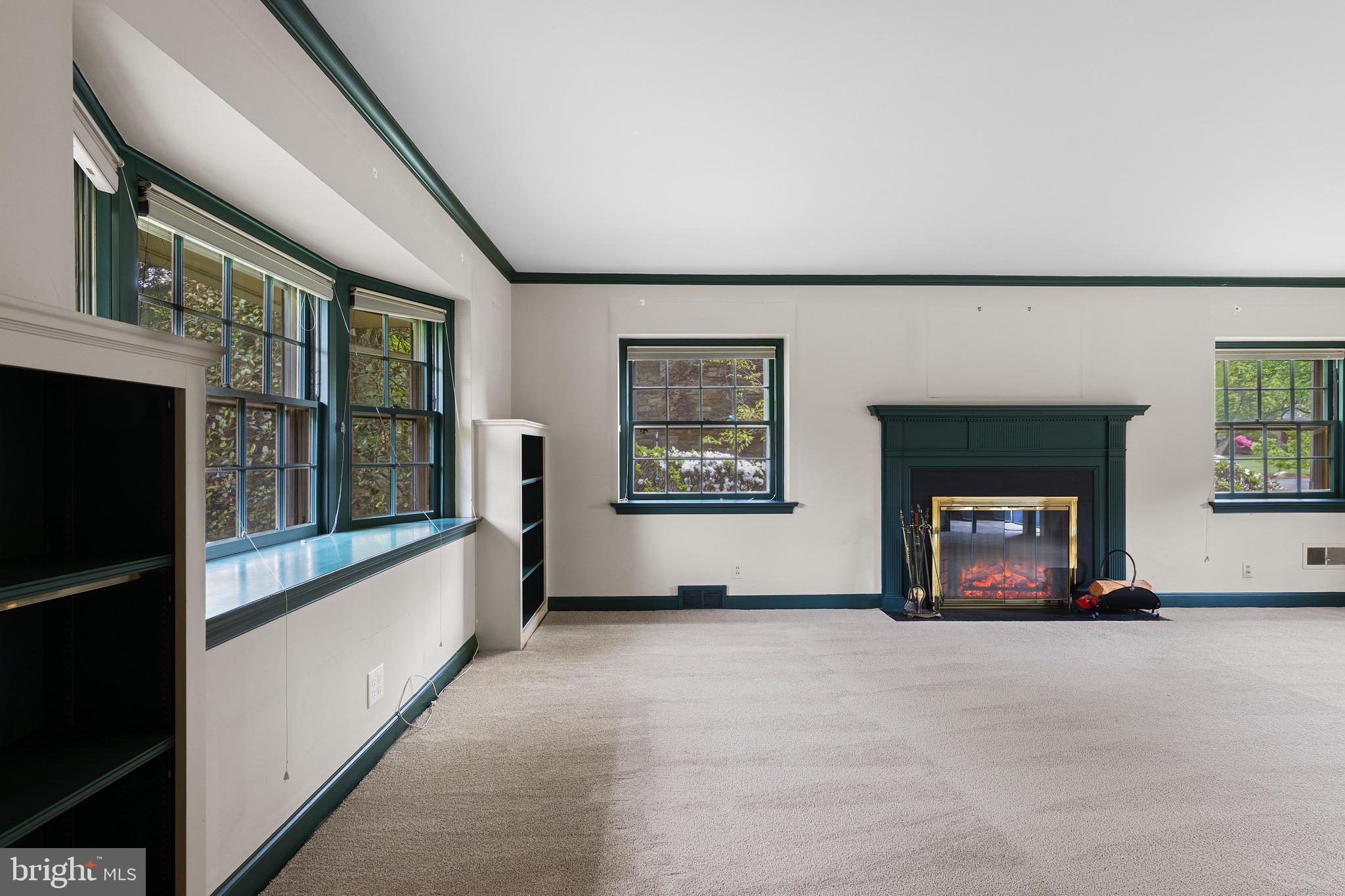 71 Forest Lane Swarthmore, PA 19081 - Photo 7 of 33 a view of an empty room with a fireplace