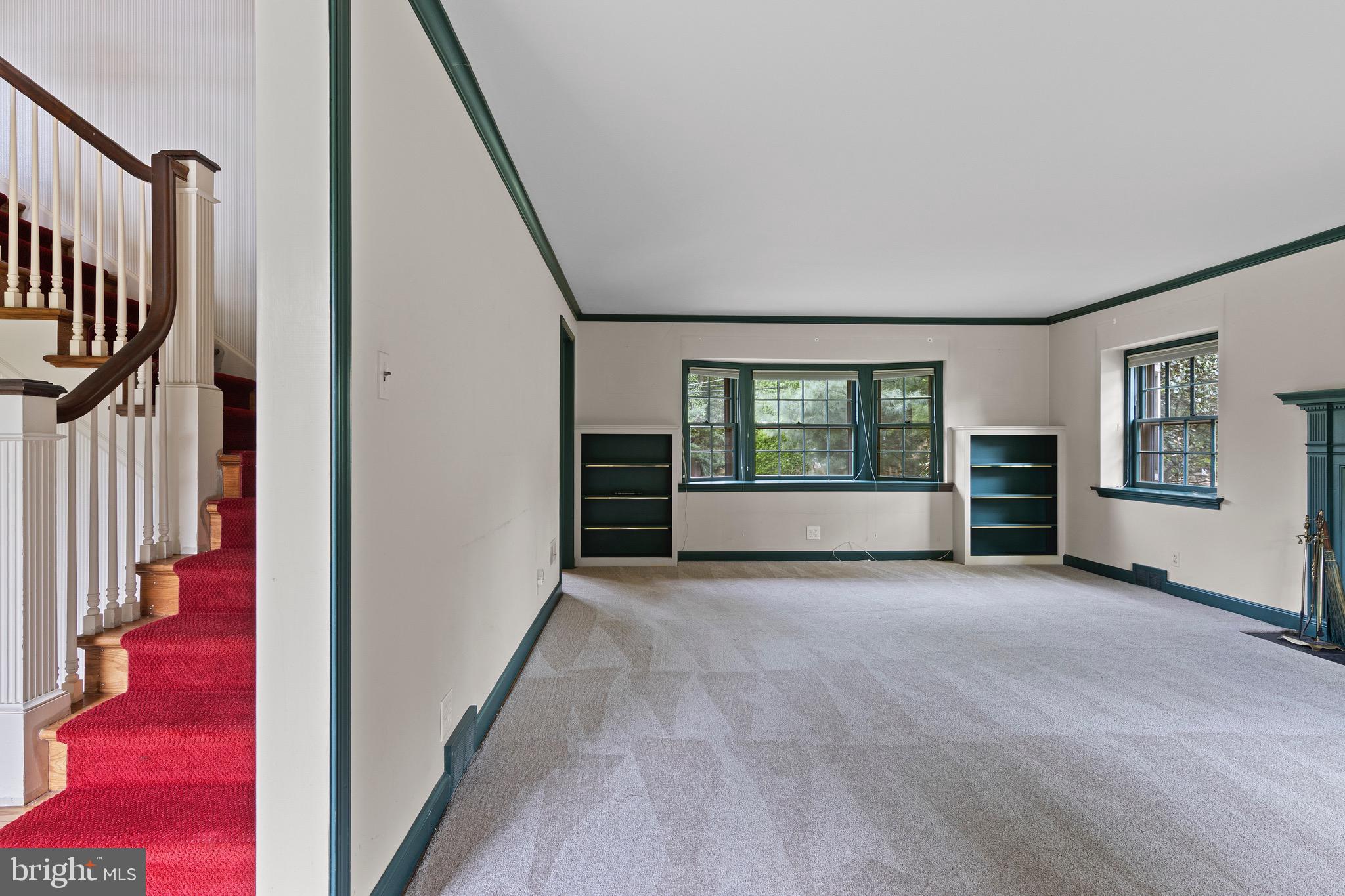 71 Forest Lane Swarthmore, PA 19081 - Photo 8 of 33 a view of an empty room with wooden floor and a window
