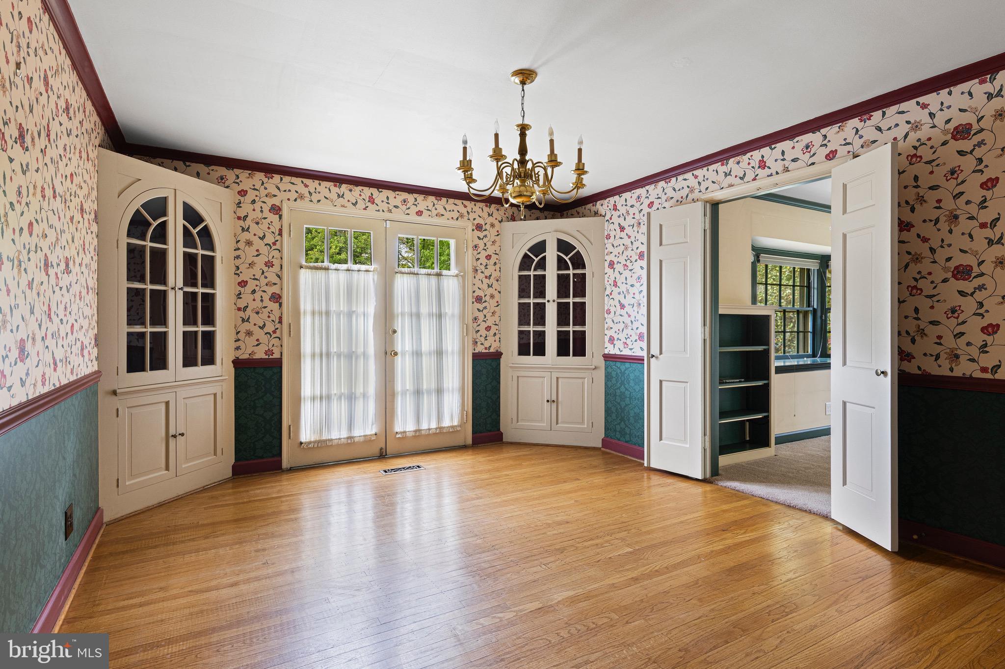 71 Forest Lane Swarthmore, PA 19081 - Photo 9 of 33 a view of a big room with wooden floor and windows