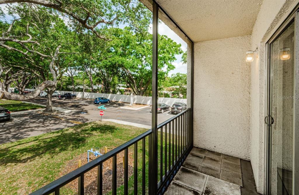 801 Russell Lane, Unit 255 Brandon, FL 33510 - Photo 31 of 38 a view of a porch with wooden floor