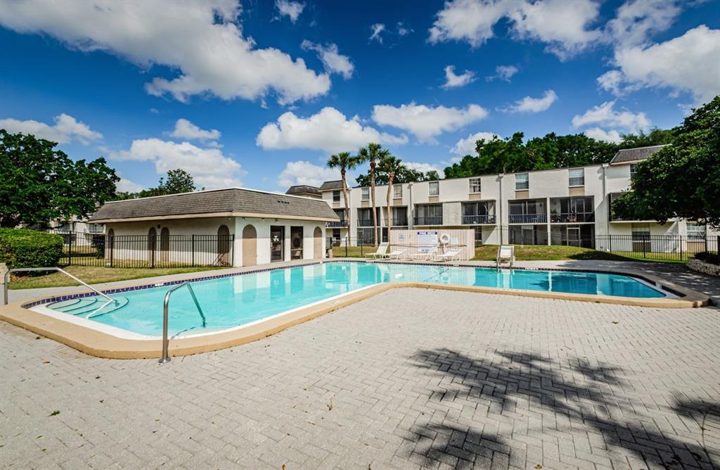 801 Russell Lane, Unit 255 Brandon, FL 33510 - Photo 36 of 38 a view of a house with a swimming pool