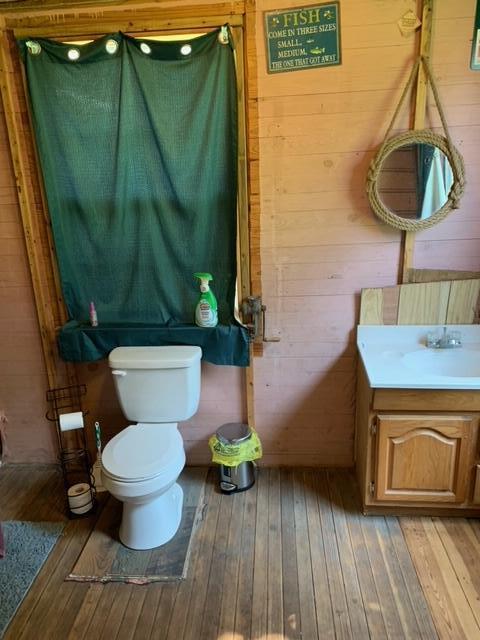 7768 Red Barrow Road Baker, FL 32531 - Photo 18 of 49 a bathroom with a toilet and a sink