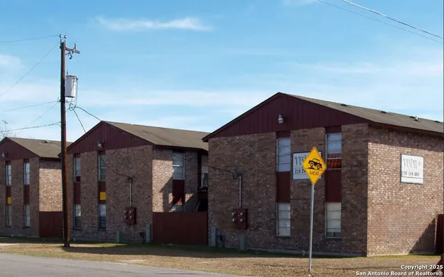 a front view of a house with yard