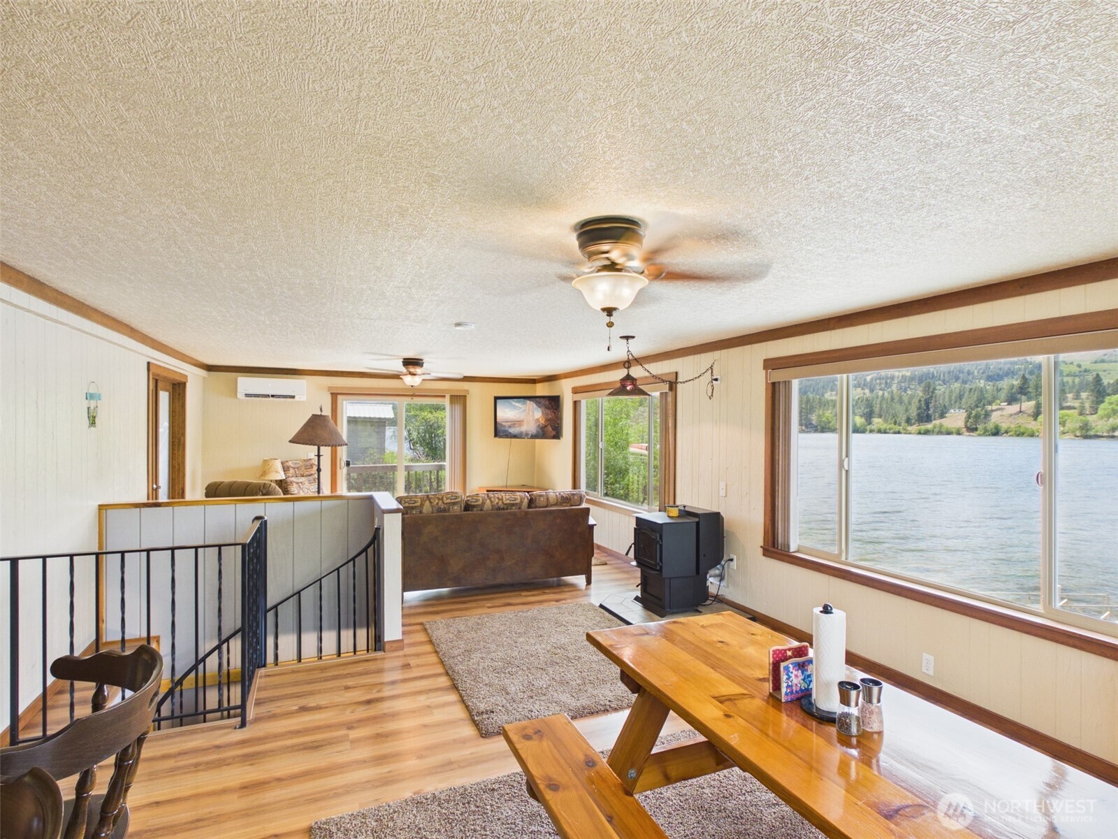 6 Marions Cove Road Republic, WA 99166 - Photo 6 of 33 a living room with furniture and large windows