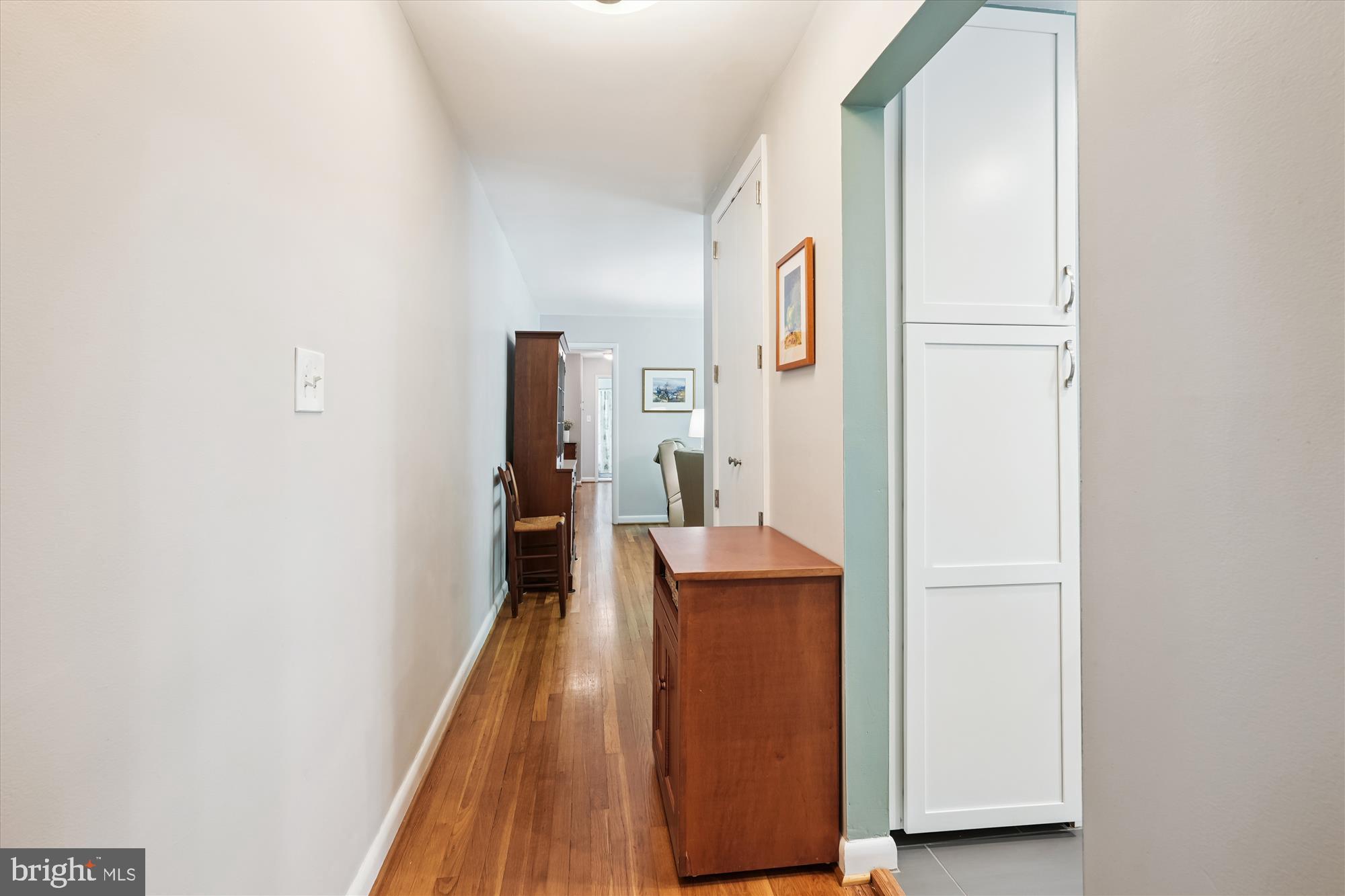 10427 Montrose Avenue, Unit 104 Bethesda, MD 20814 - Photo 2 of 37 view of hall way with mirror