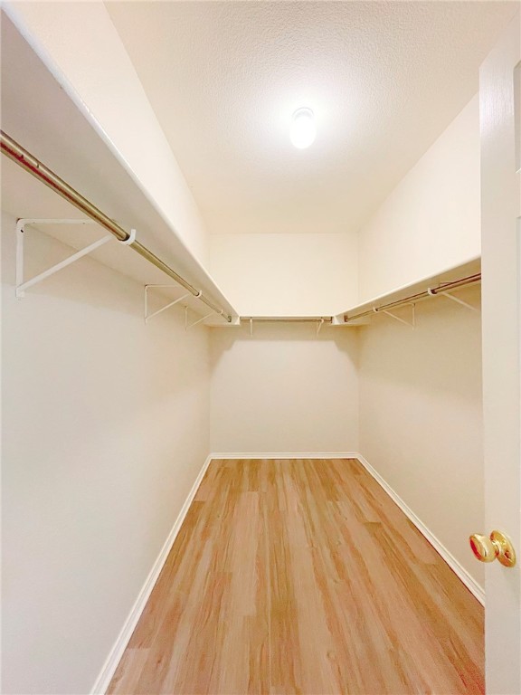 2211 Little Tree Bend Cedar Park, TX 78613 - Photo 13 of 23 a view of a room with wooden floor
