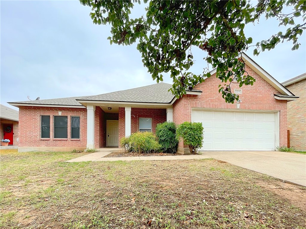 2211 Little Tree Bend Cedar Park, TX 78613 - Photo 2 of 23 a front view of a house with a yard and garage