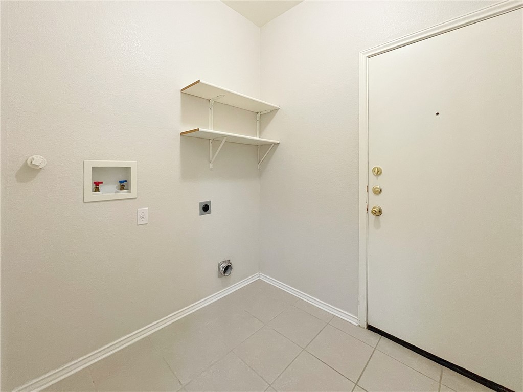 2211 Little Tree Bend Cedar Park, TX 78613 - Photo 22 of 23 a view of small space with racks on the wall