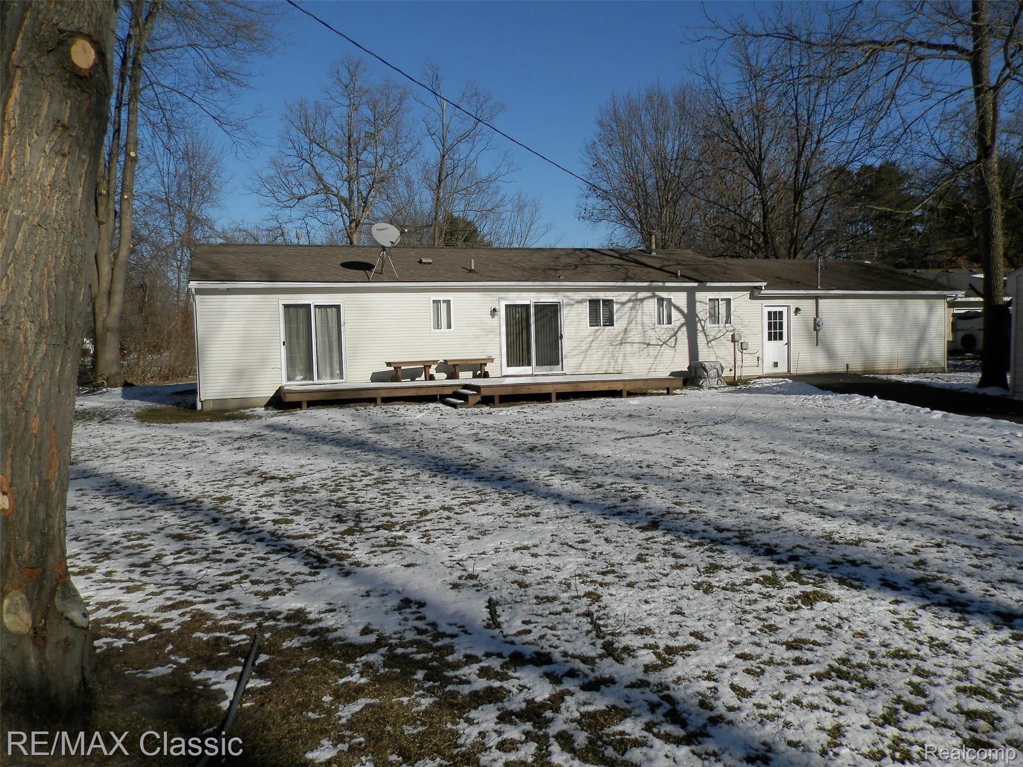 1082 South Hughes Road Howell, MI 48843 - Photo 27 of 32 Rear of home