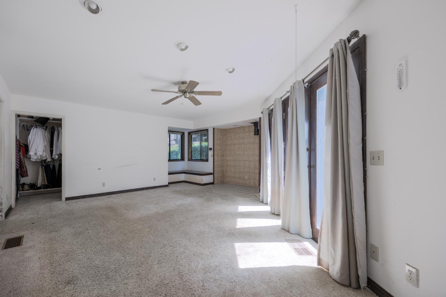 2070 King Of The Mountain Road Pollock Pines, CA 95726 - Photo 13 of 53 a view of a livingroom with a staircase