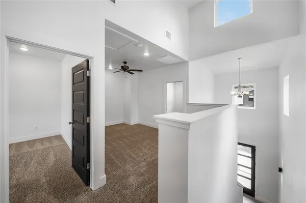 a view of livingroom with hardwood floor and hallway