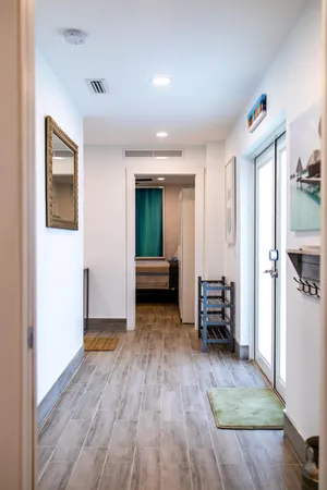 a view of a bedroom from the hallway