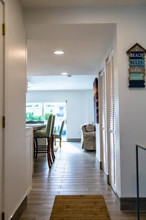 a kitchen with stainless steel appliances kitchen island granite countertop a stove a sink and a microwave