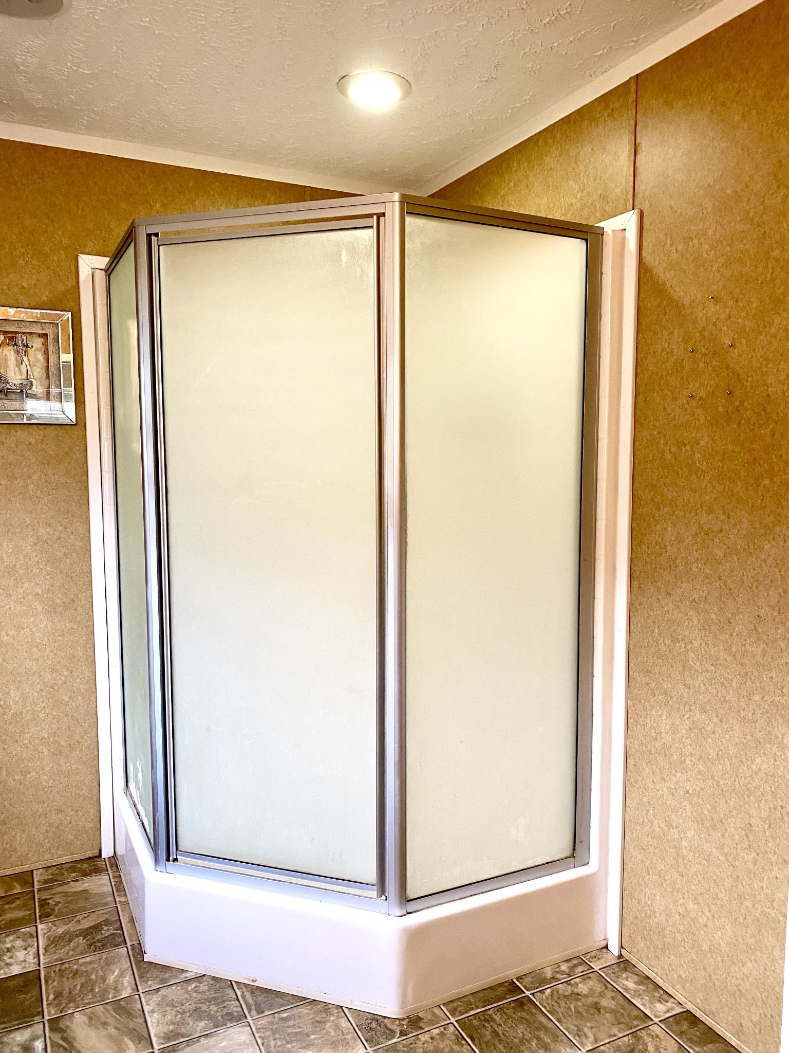 4619 Leanna Road Murfreesboro, TN 37129 - Photo 19 of 32 a view of a bathroom with a glass shower door