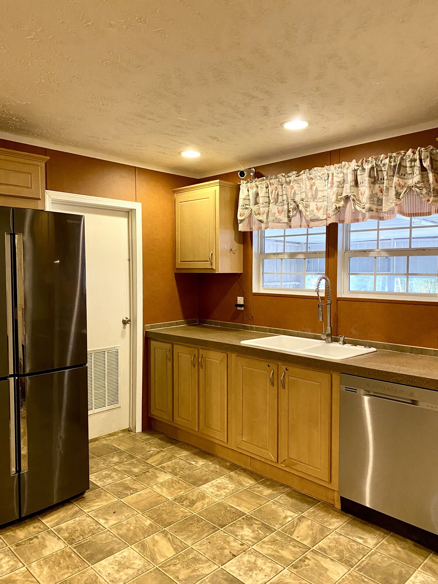 4619 Leanna Road Murfreesboro, TN 37129 - Photo 5 of 32 a kitchen with stainless steel appliances granite countertop a refrigerator and a sink