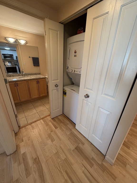 8 Museum Way, Unit 802 Cambridge, MA 02141 - Photo 25 of 39 a view of a kitchen from the hallway