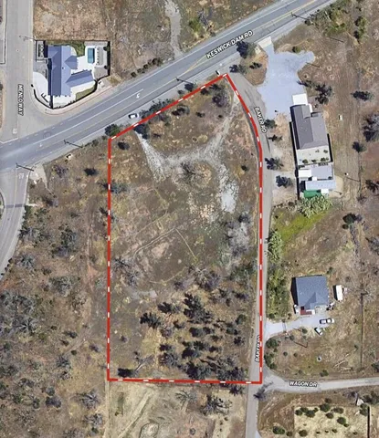 a view of a house with a street