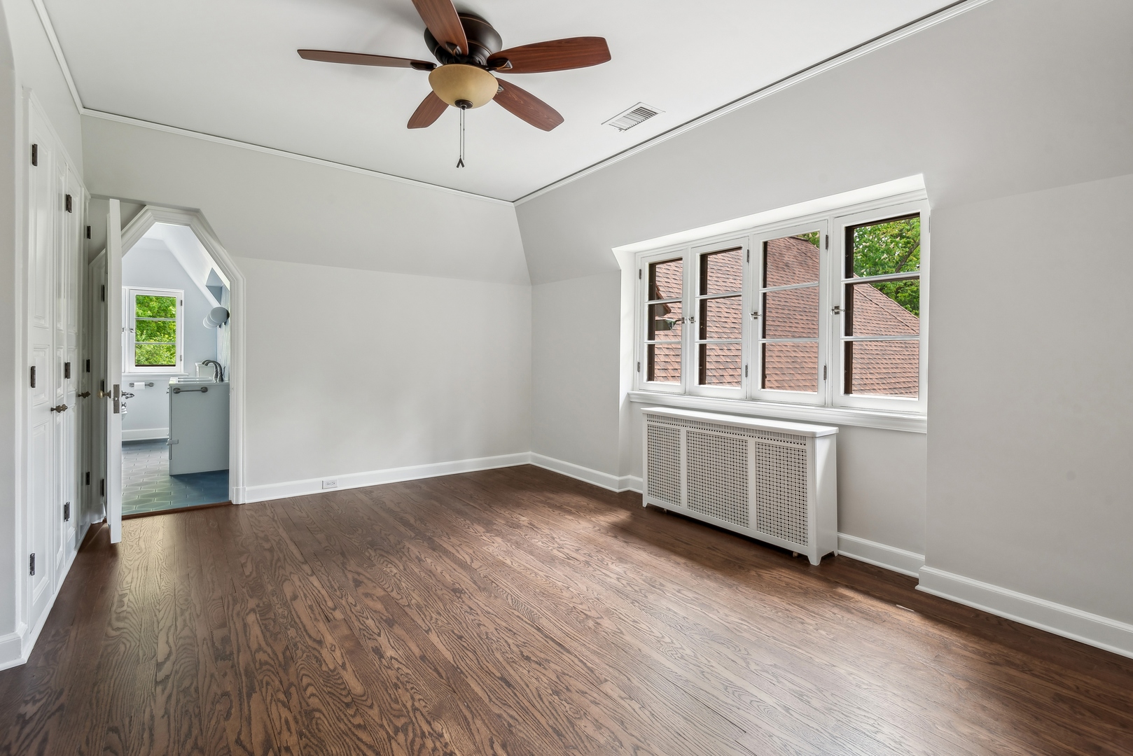 2743 Illinois Road Wilmette, IL 60091 - Photo 35 of 61 wooden floor in an empty room with a window