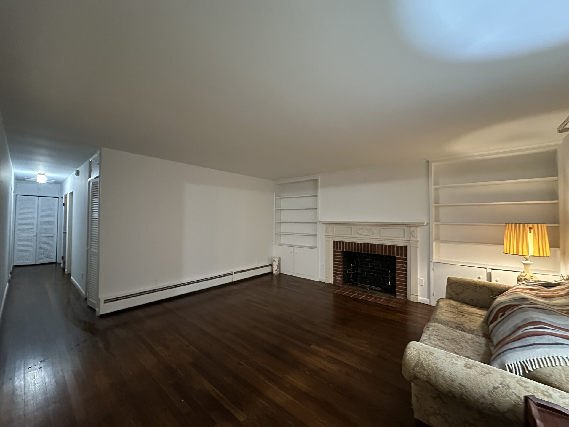 10 Carleton Street Greenwich, CT 06830 - Photo 4 of 8 a living room with furniture and a fireplace