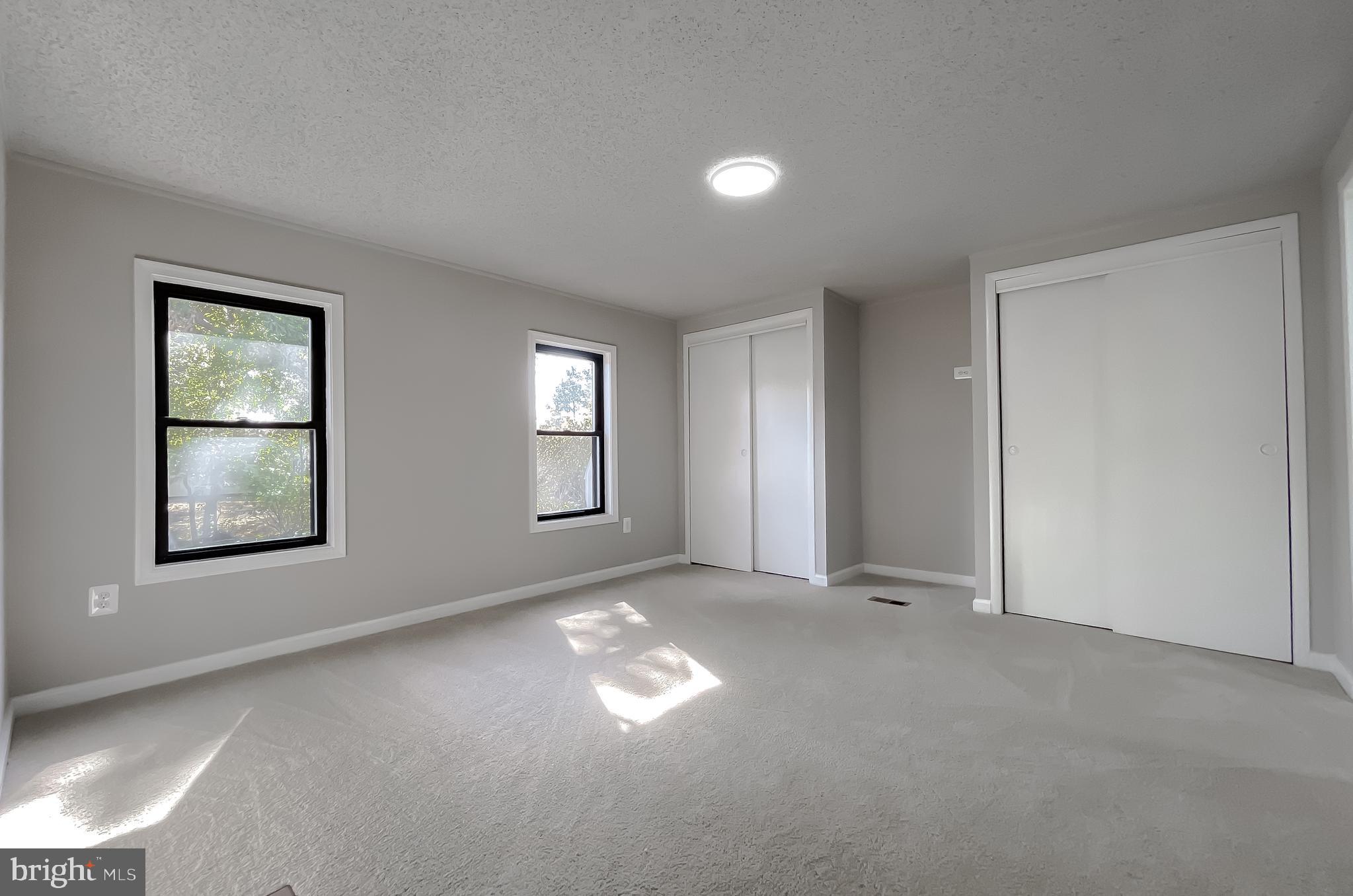 22489 Wainwright Court California, MD 20619 - Photo 26 of 41 an empty room with windows