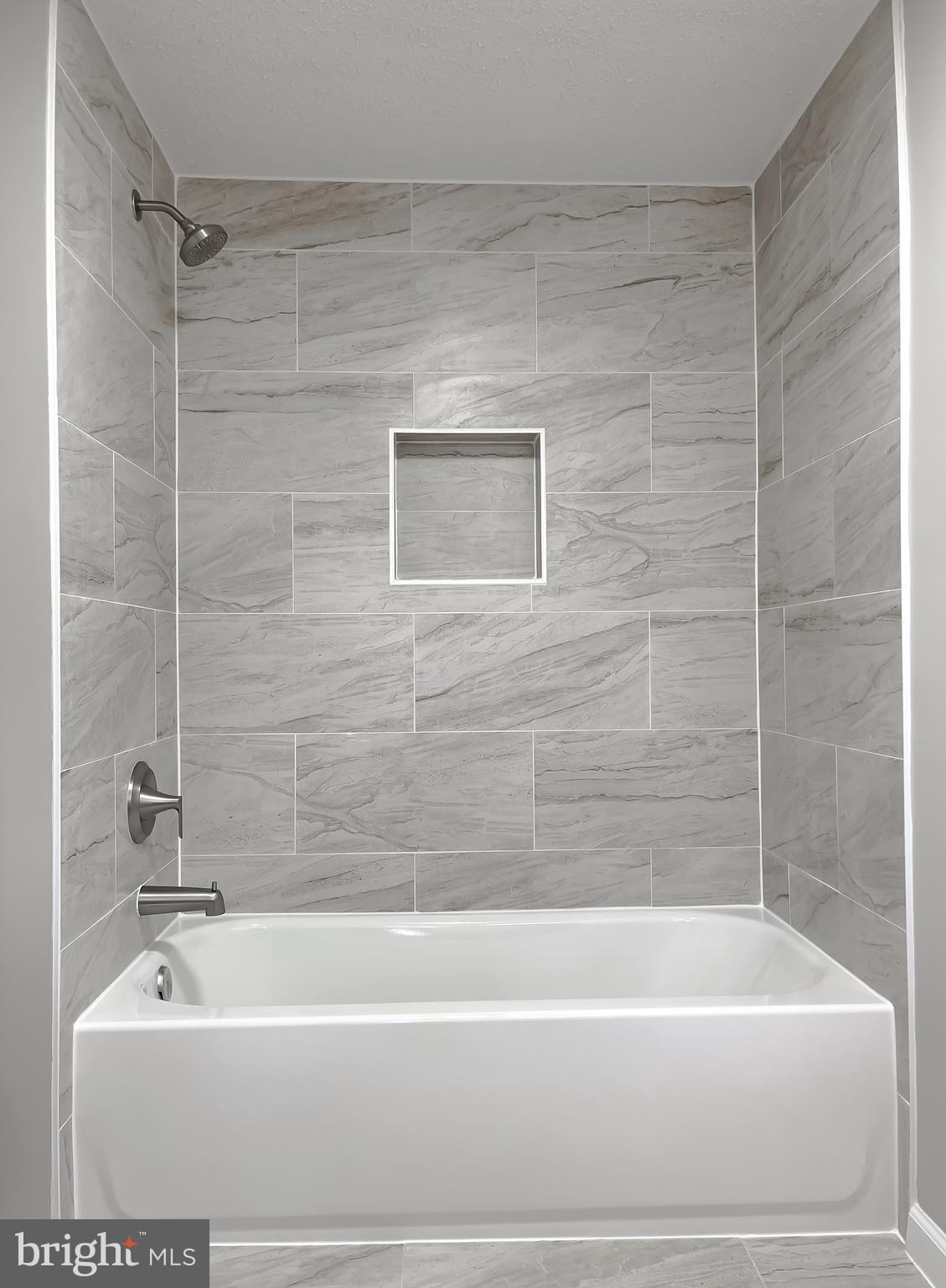 22489 Wainwright Court California, MD 20619 - Photo 30 of 41 a bathroom with a bathtub and a shower