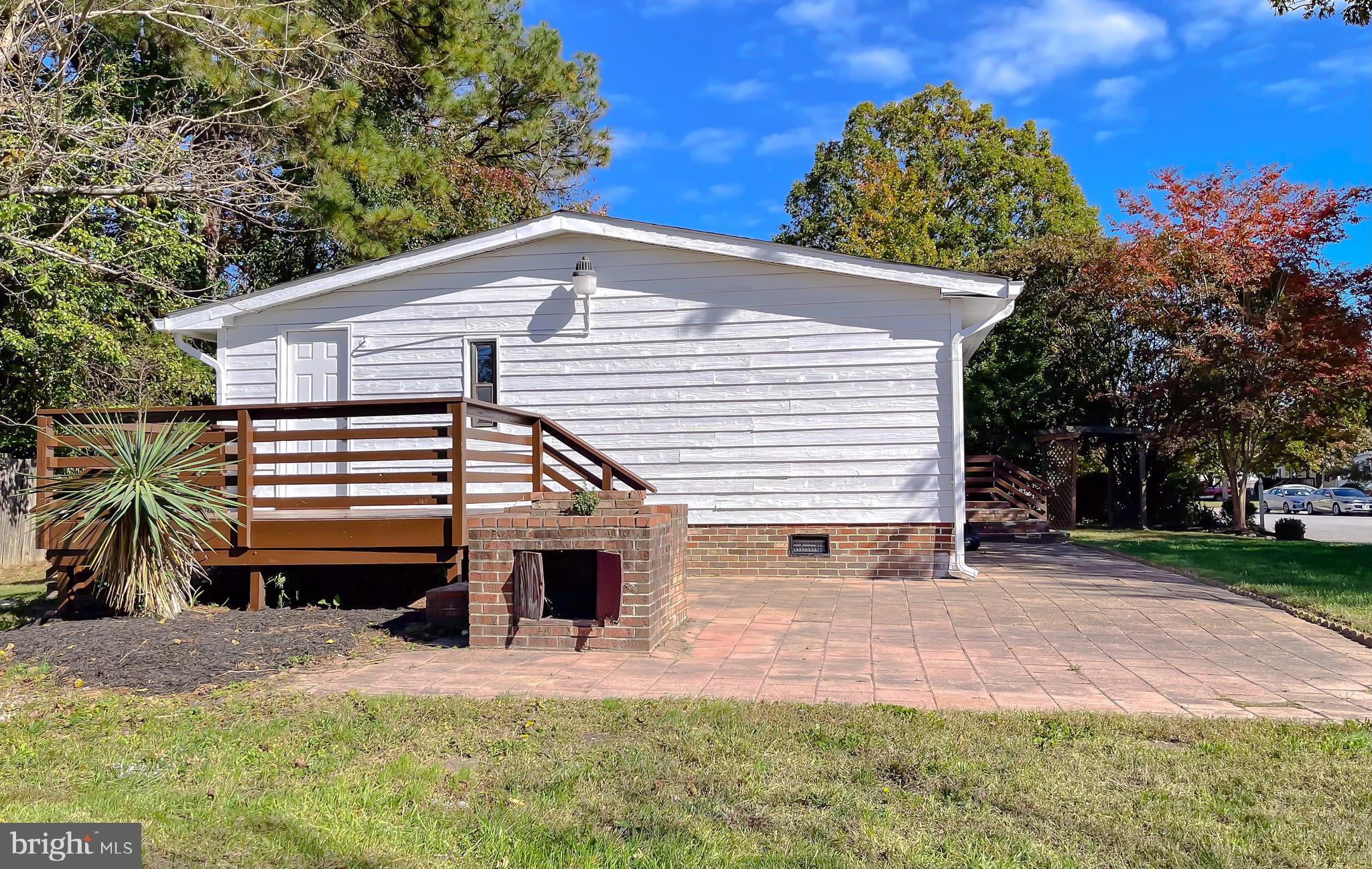 22489 Wainwright Court California, MD 20619 - Photo 35 of 41 a view of a house with a yard