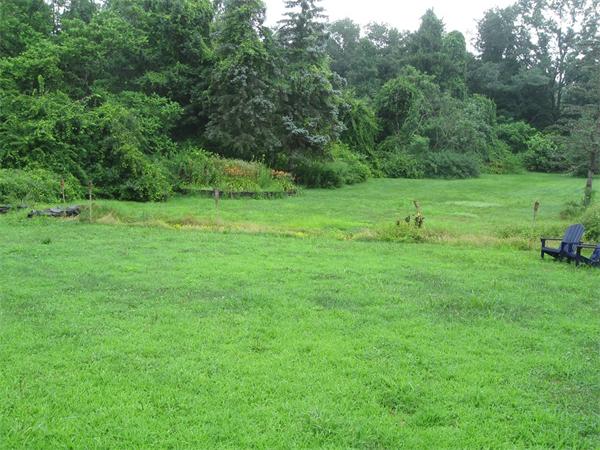 242 Florence Road Northampton, MA 01062 - Photo 12 of 16 a view of a green field with trees