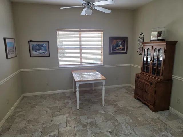 a room with furniture and a window