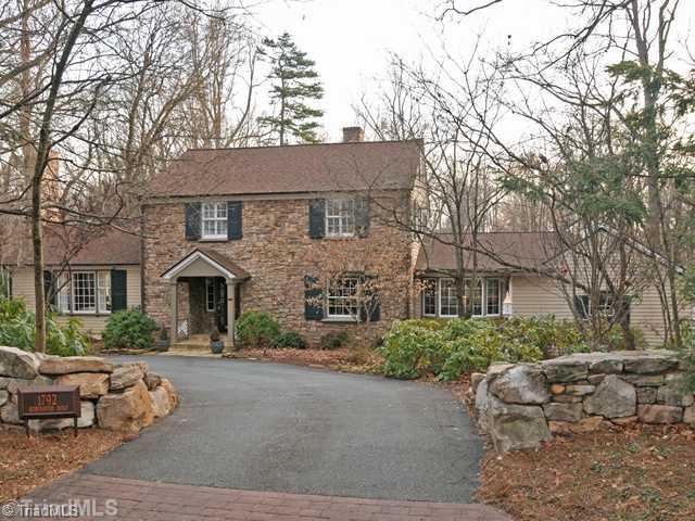 1792 Robinhood Road Winston-Salem, NC 27104 - Photo 1 of 16 Exterior Front. Front Exterior with stone walls and circular drive