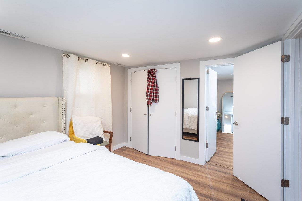 7452 Briery Branch Road Dayton, VA 22821 - Photo 23 of 66 a bedroom with a bed and a walk in closet