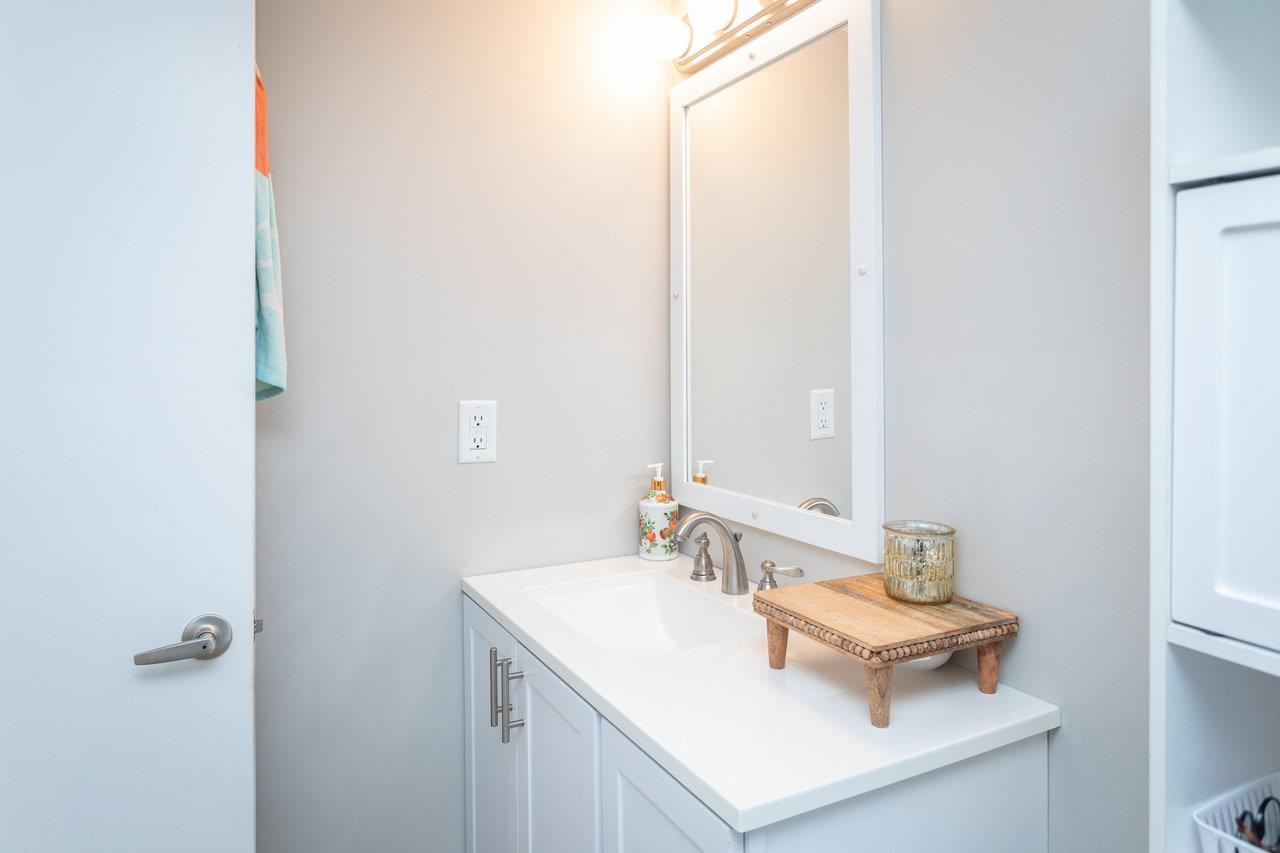 7452 Briery Branch Road Dayton, VA 22821 - Photo 31 of 66 a bathroom with a sink and a mirror