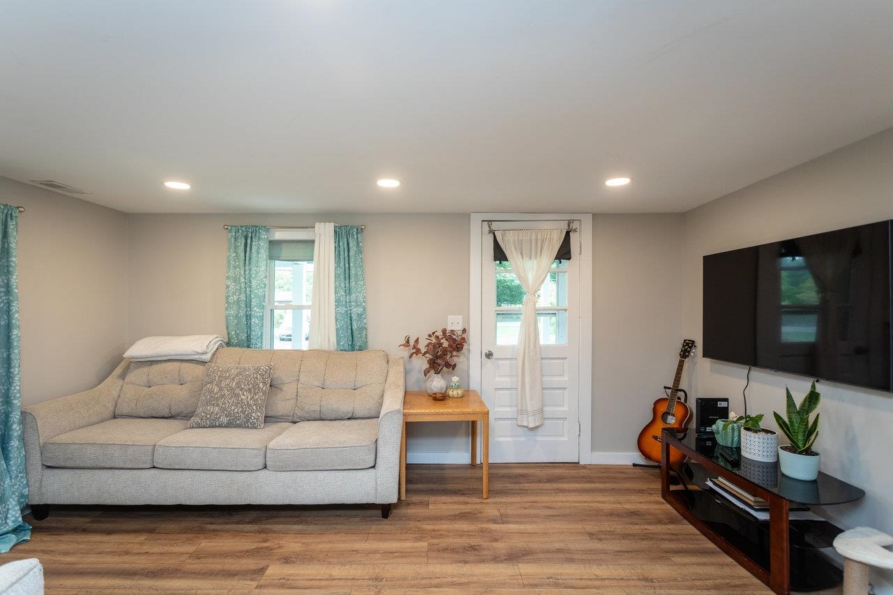 7452 Briery Branch Road Dayton, VA 22821 - Photo 4 of 66 a living room with furniture and a flat screen tv