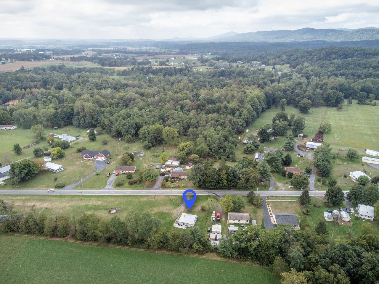 7452 Briery Branch Road Dayton, VA 22821 - Photo 49 of 66 an aerial view of multiple houses with yard