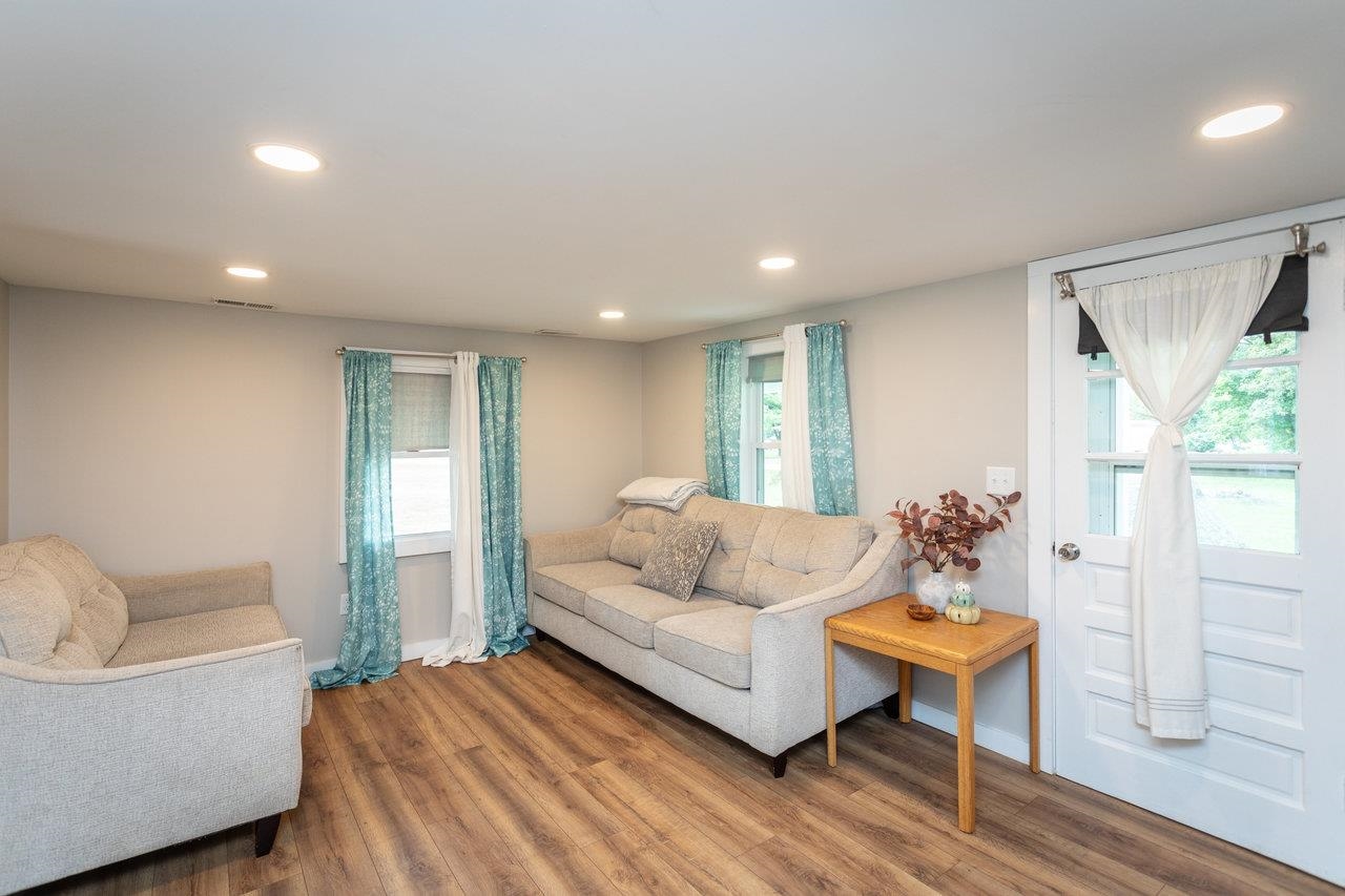 7452 Briery Branch Road Dayton, VA 22821 - Photo 5 of 66 a living room with furniture and a large window