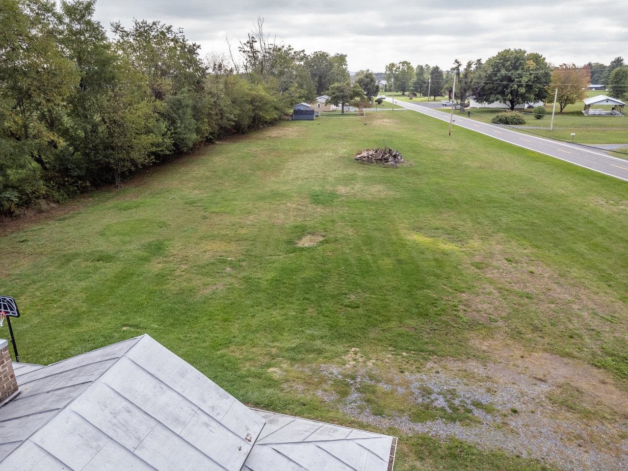 7452 Briery Branch Road Dayton, VA 22821 - Photo 55 of 66 a view of a lake with a big yard