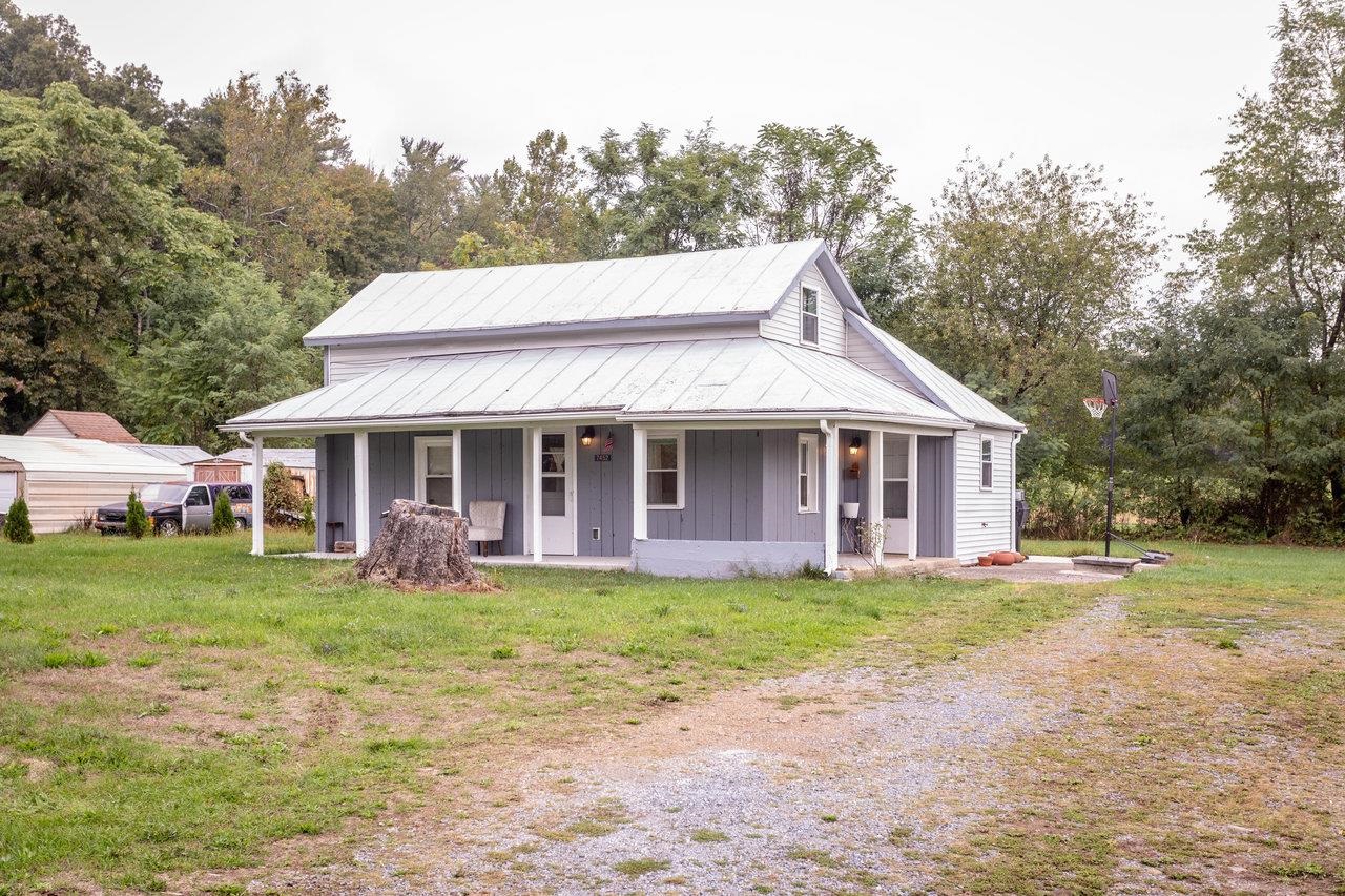 7452 Briery Branch Road Dayton, VA 22821 - Photo 58 of 66 a view of a house with a yard and trees
