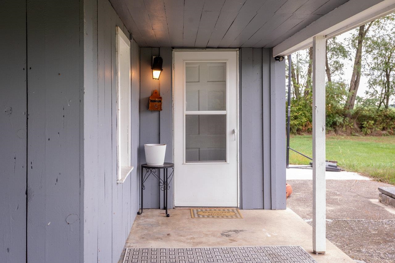 7452 Briery Branch Road Dayton, VA 22821 - Photo 60 of 66 a view of a hallway with a porch