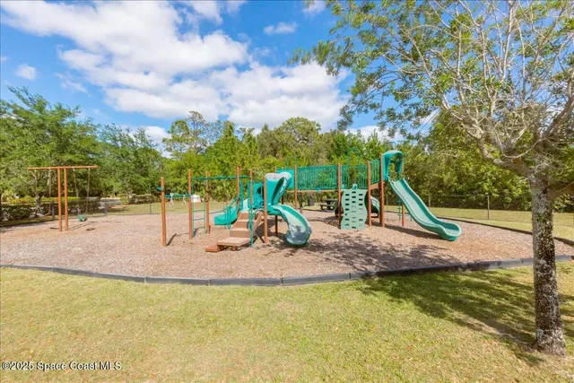 a house with a tree in front of it