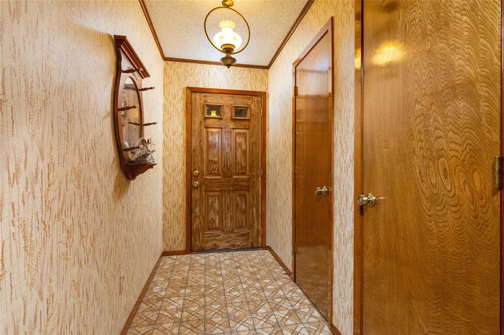 970 Live Oak Road Santo, TX 76472 - Photo 12 of 40 a bathroom with a glass door shower and vanity