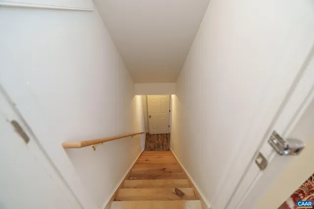 a bathroom with a mirror and a sink