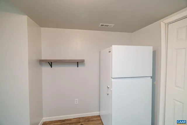 a view of a two chairs in the roof deck