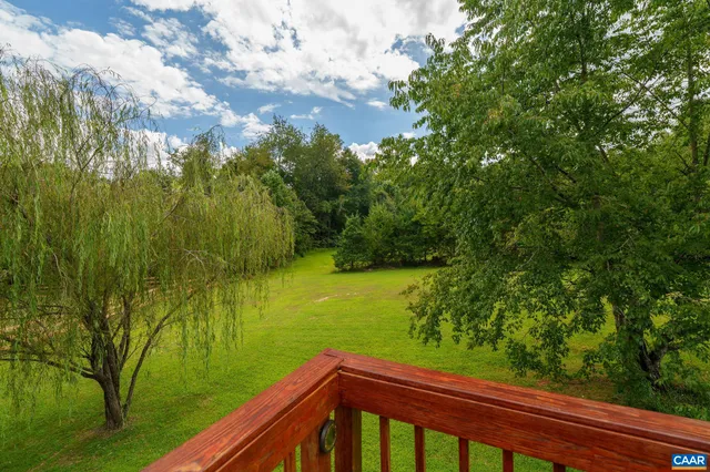 an aerial view of a house with a garden