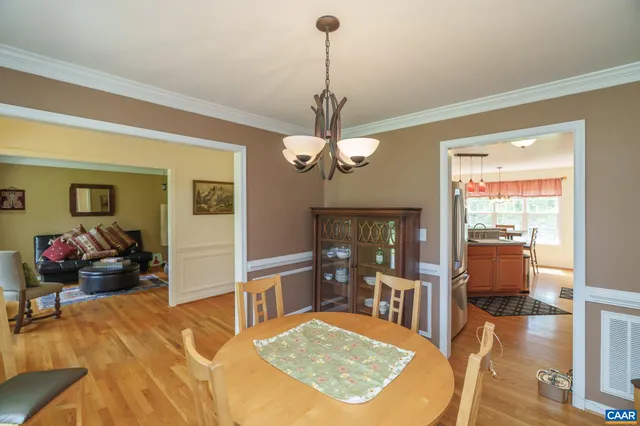 a view of a livingroom with furniture and front door